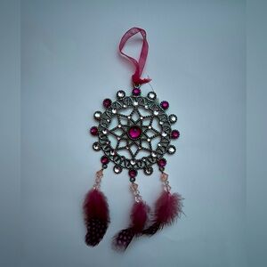 silver and pink dreamcatcher with pink feathers and crystals